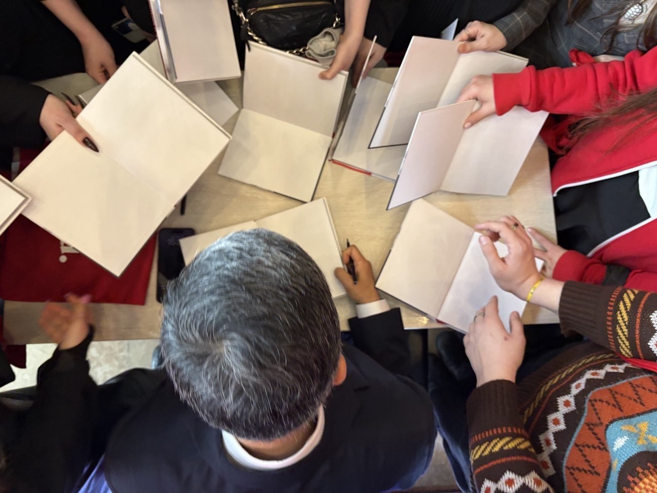 Readers’ Meeting · Signing Table